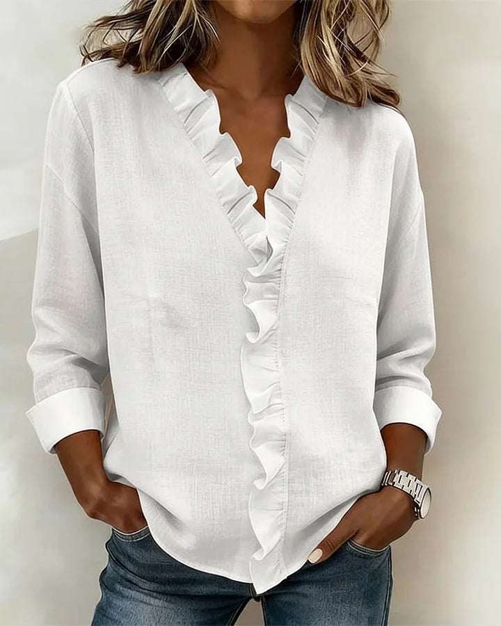 Indie | Blouse avec volants, décolleté en V et manches longues