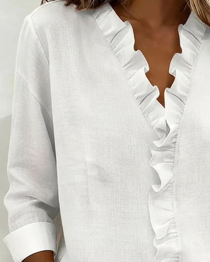Indie | Blouse avec volants, décolleté en V et manches longues