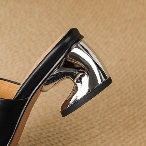 Mules en cuir Virelle Curve avec talon