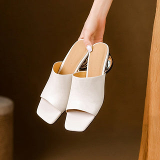 Mules en cuir Virelle Curve avec talon