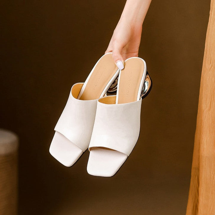 Mules en cuir Virelle Curve avec talon