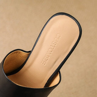 Mules en cuir Virelle Curve avec talon