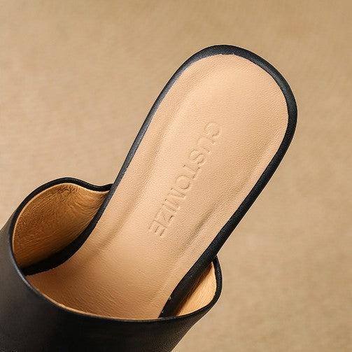 Mules en cuir Virelle Curve avec talon