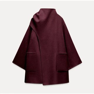 "Eva | Kappa mit Schal" pourrait être réécrit comme "Eva | Manteau à capuche avec écharpe".